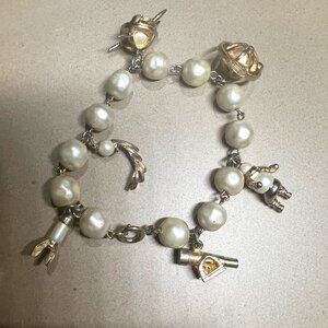 VINTAGE ASTRONAUT AND SPACE CHARM BRACELET CIRCA 1960  A RARE FIND!
